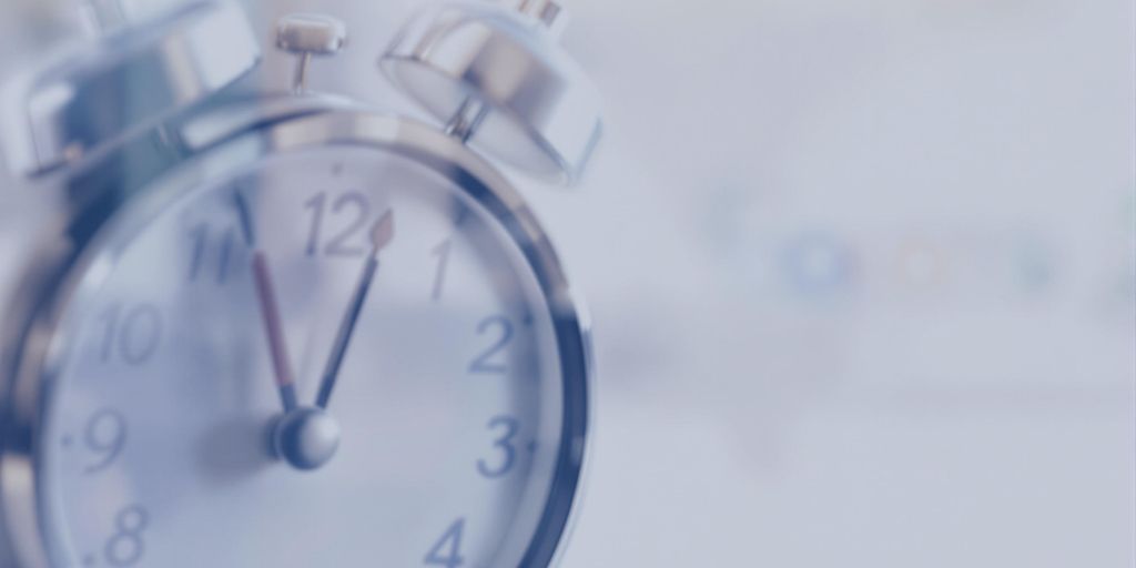 A timer with gears illustrating the waiting period for ads.